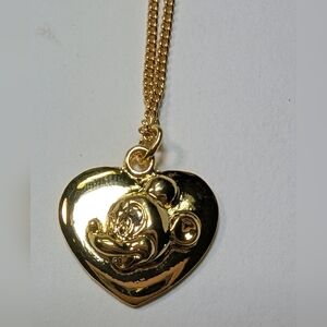 Wendy Ge Mickey Mouse gold pendant.